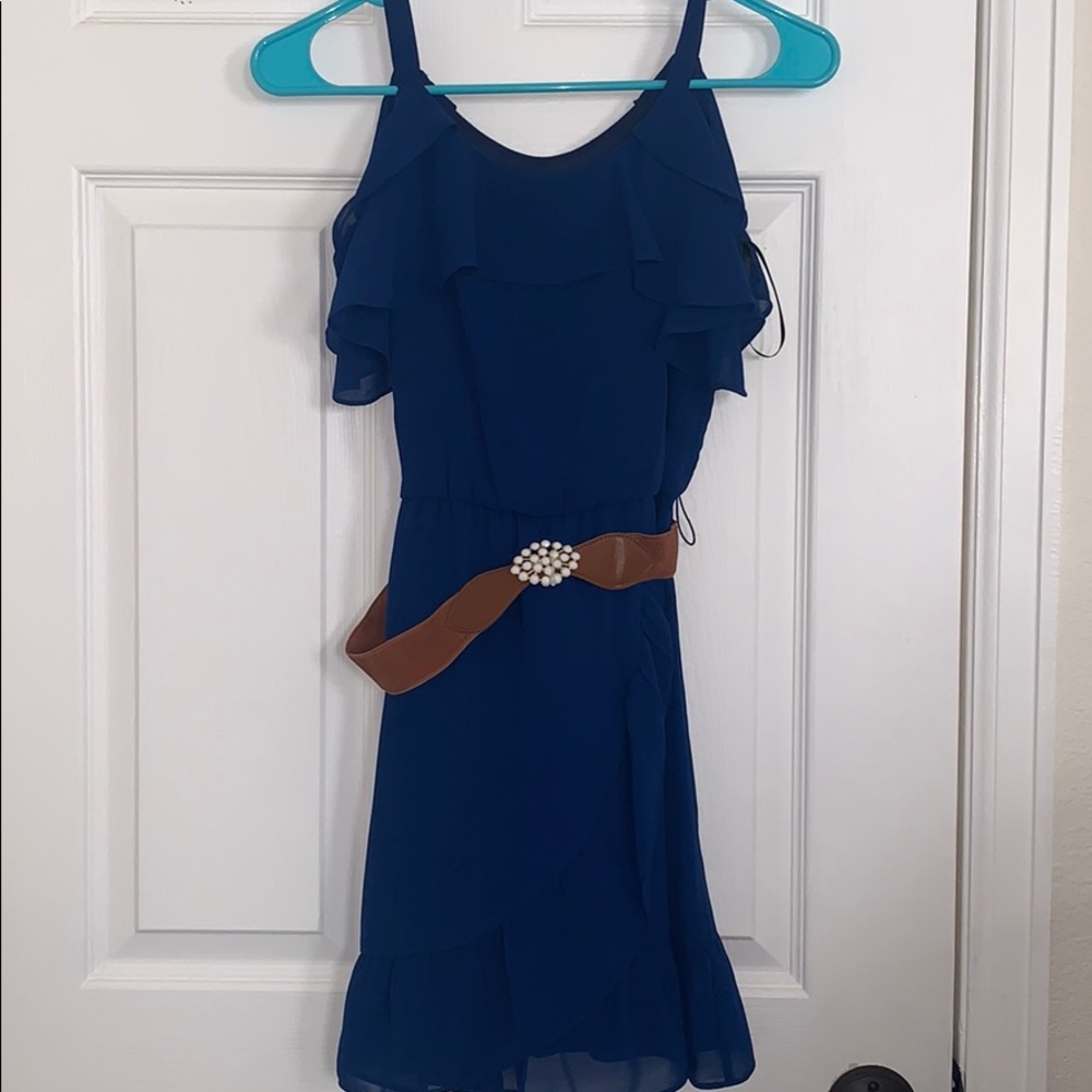 Kids royal blue dress with brown belt.